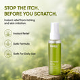 Load image into Gallery viewer, A bottle of Dadaz Plant Itch Relief Spray stands on a mossy rock against a soft green blurred natural background. Large text on the left reads 'STOP THE ITCH.
