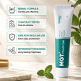 Load image into Gallery viewer, A tube of Dadaz Pharma MGT Mouth Gel shown on a light marble surface with mint leaves.
