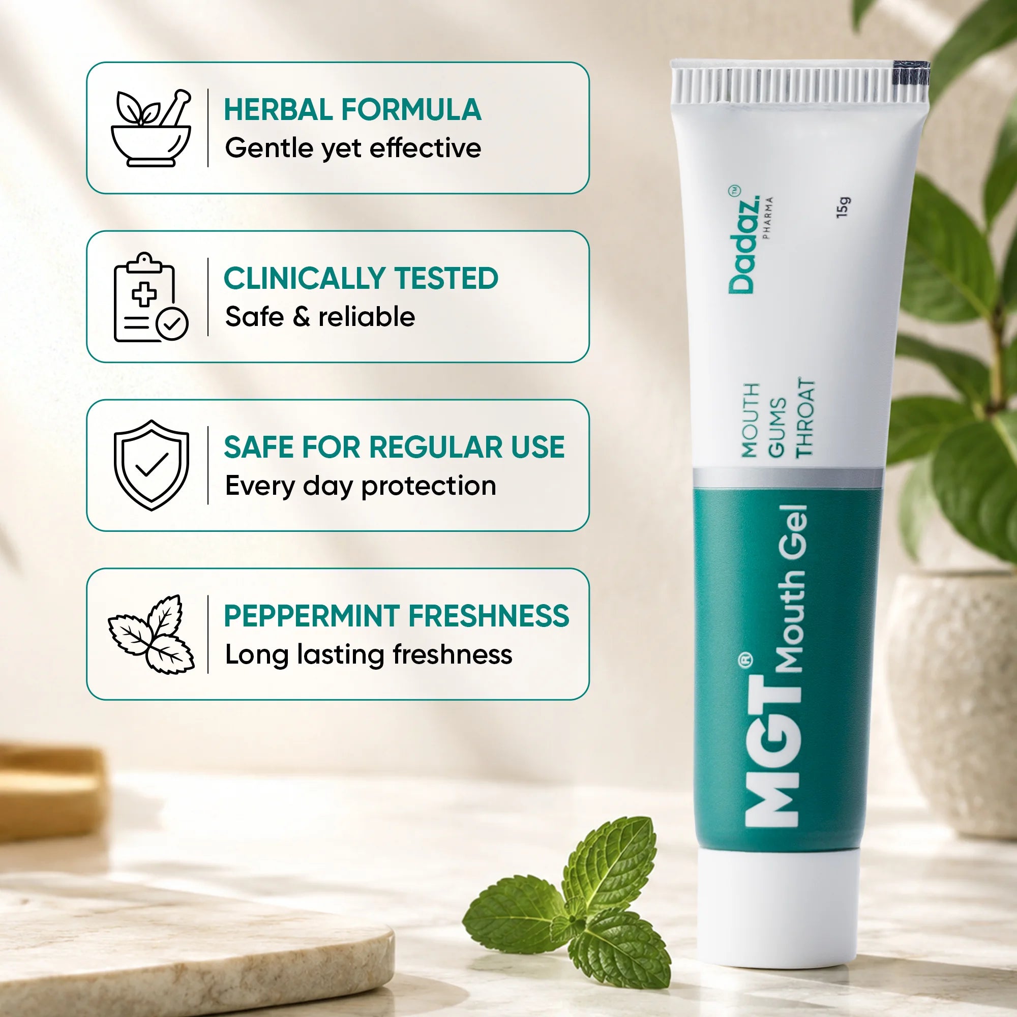 A tube of Dadaz Pharma MGT Mouth Gel shown on a light marble surface with mint leaves.